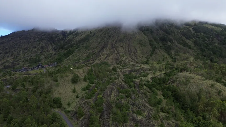 Mount Batur in the clouds, seen from Kintamani